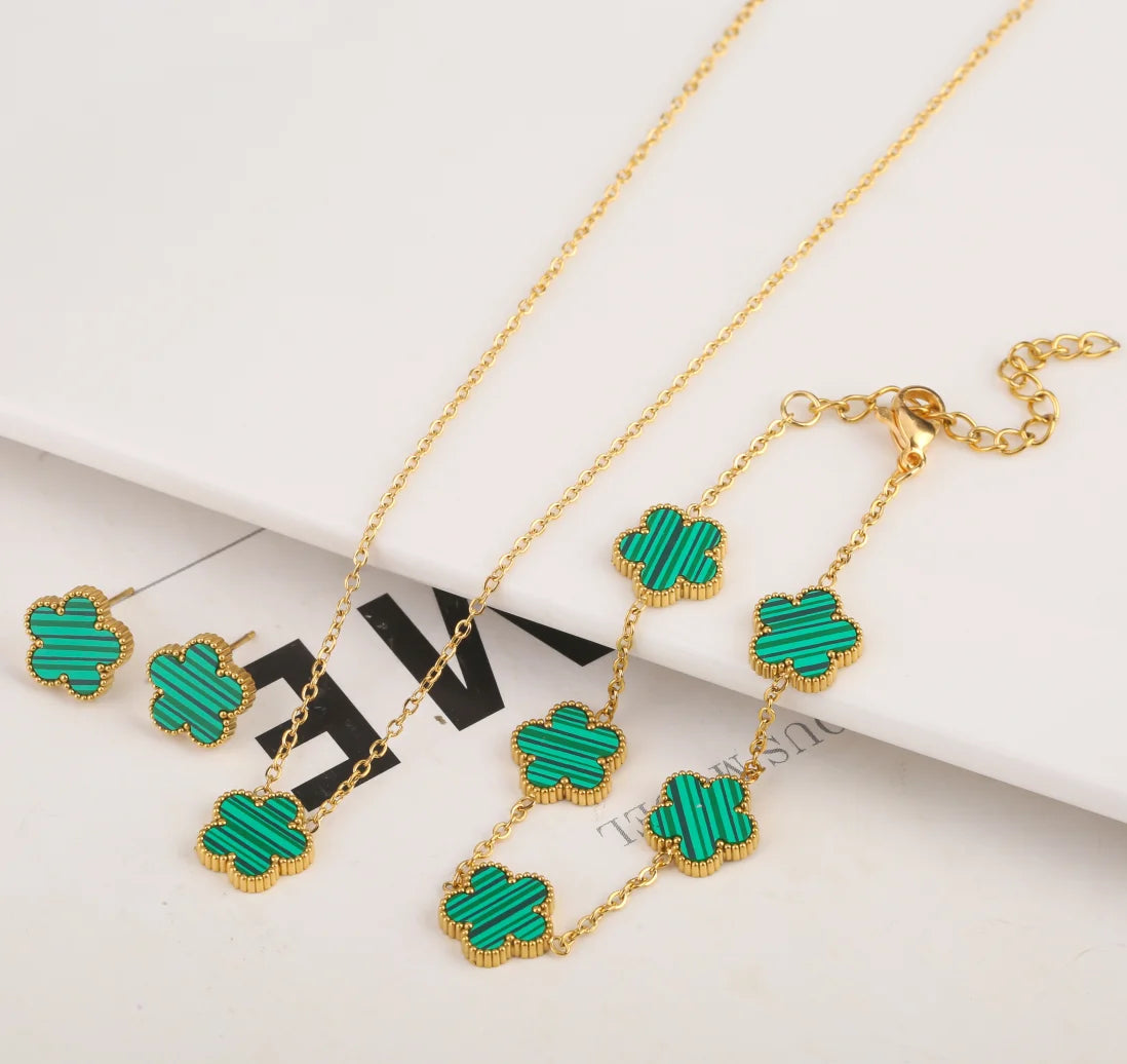 Conjunto de joyas de acero inoxidable, minimalista, creativo, con hojas y pétalos de flores naturales, collar con colgante, aretes y brazalete.