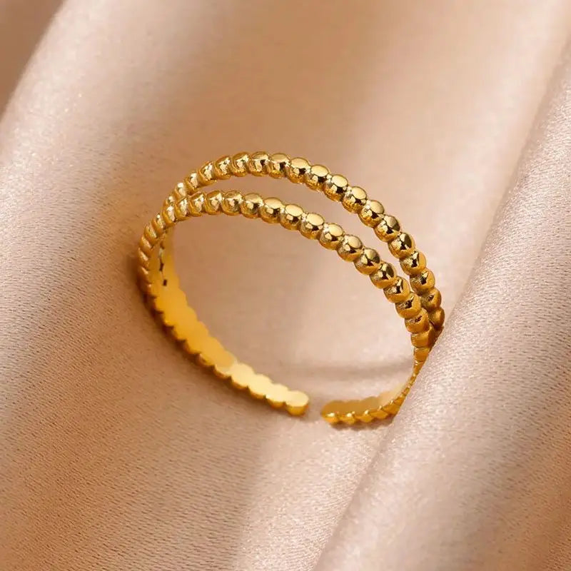 Anillos de acero inoxidable para mujer, anillo geométrico multicapa en color dorado que se abre en el dedo. Novedad en joyería de moda para bodas y fiestas. Regalo.
